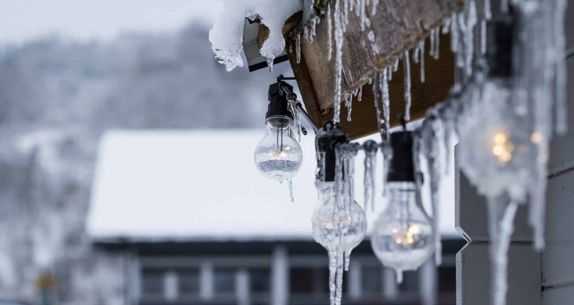 LED bulbs covered in frozen ice and cold weather