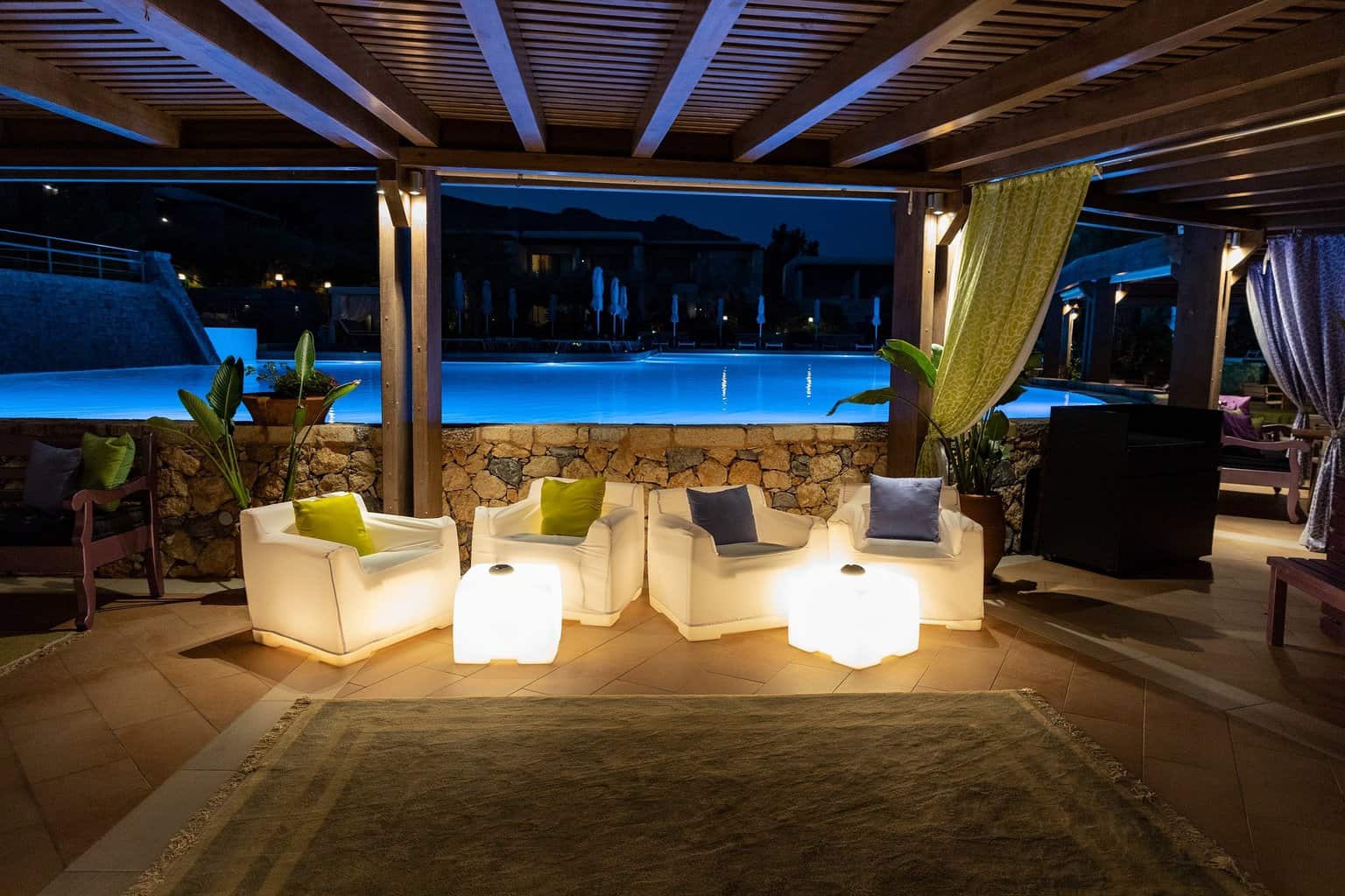 Outdoor pool with LED light fixtures